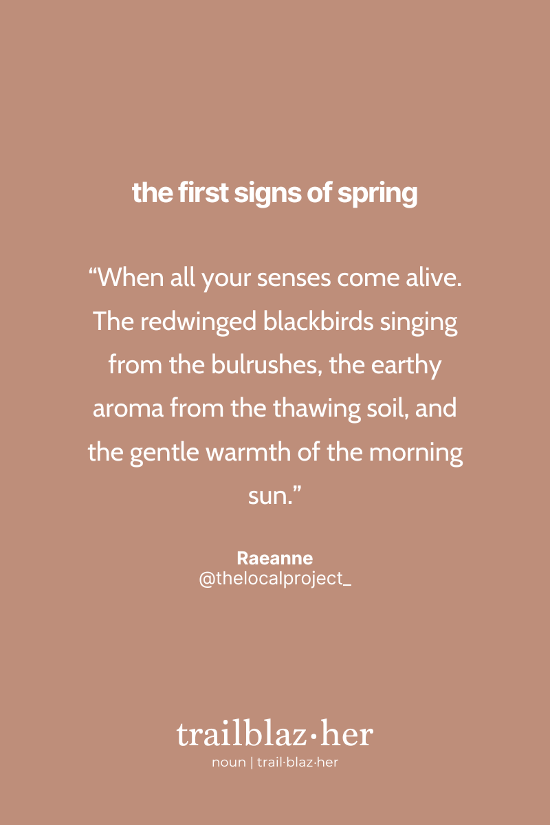 A graphic with a muted rose background displaying the text "the first signs of spring" at the top. Below is a quote by Raeanne celebrating the sensory awakening of spring with the sights and sounds of nature. The term "trailblaz.her" is labeled as a noun at the bottom.